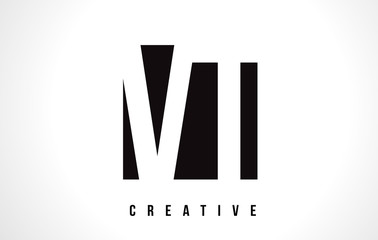 VT V T White Letter Logo Design with Black Square.