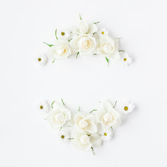 Flowers composition. Wreath made of white flowers. Flat lay, top view