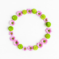 Naklejka premium Flowers composition. Wreath made of various colorful flowers on white background. Flat lay, top view