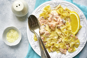 Pasta with creamy salmon and parmesan.Top view.