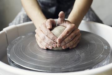 Ceramic working process with clay potter's wheel
