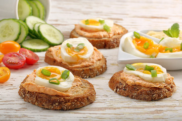 Sandwiches with salmon paste and egg
