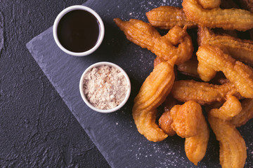 Traditional Spanish and Mexican dessert churros with hot chocolate