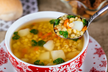 Split pea soup with ham, carrots and potatoes