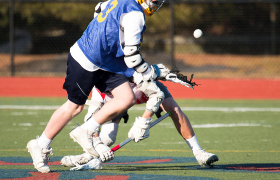 Fighting for the ball during lacrosse game
