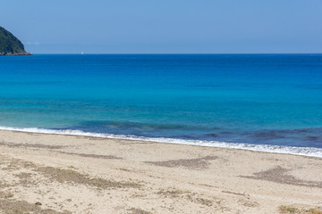 Fototapeta na wymiar Panoramic view of Girapetra Beach with blue waters, Lefkada, Ionian Islands, Greece