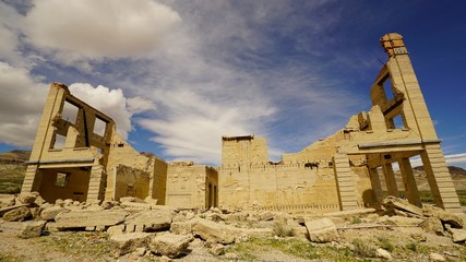 Fototapeta na wymiar Ruins of a ghost town named Rhyolite Nevada. Gold mining town 1907-1920.