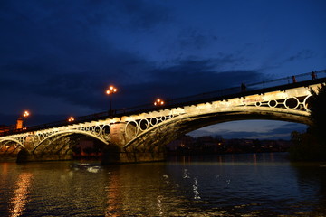 Obraz na płótnie Canvas Abendstimmung Triana Brücke Sevilla