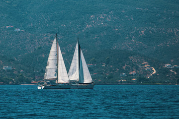 Fototapeta premium Sailboats at regatta. Sailing at the Aegean Sea..