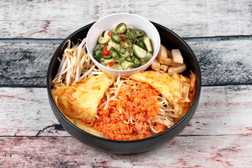 Pastry stuffed crispy egg crepe .