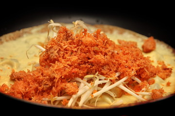 Cooking, ,Pastry stuffed crispy egg crepe in pan.