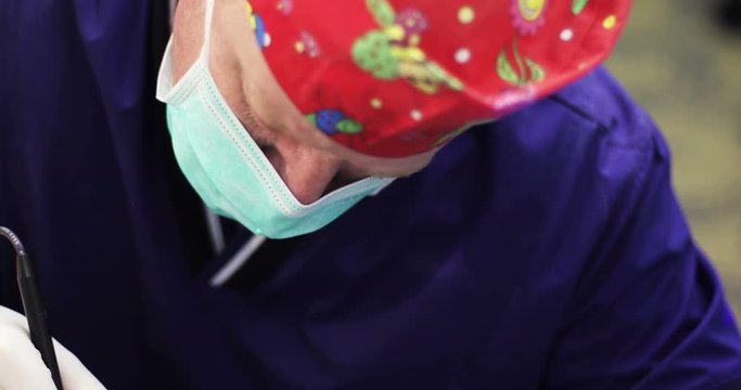 4K Close up. Doctor in mask making plastic surgery.
