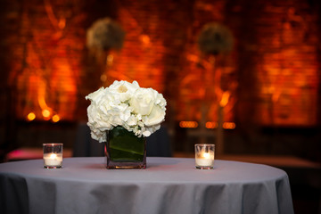 White flowers bouquet on the table at the wedding 