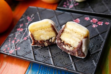 Japanese traditional dessert. glutinous rice cake or sticky rice cake. with banana.