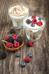 Healthy breakfast with Fresh greek yogurt, flakes and berries