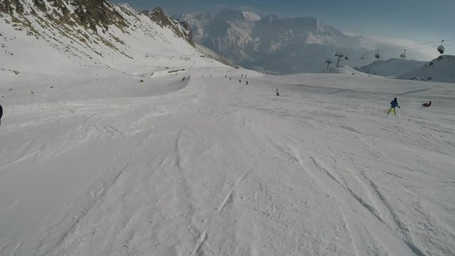 Active winter skiing holidays.
Ride on an old ski lift from the perspective of skiers.
