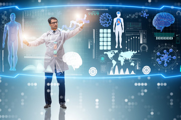 Doctor in futuristic medical concept pressing button