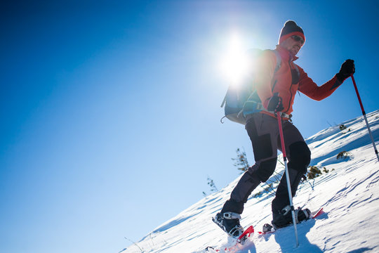 Climber in the winter mountains.