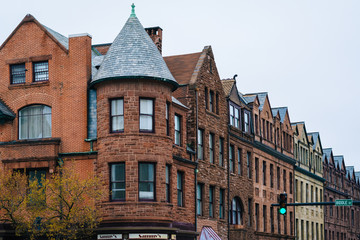Historic buildings at the intersection of Charles Street and Biddle Street, in Mount Vernon, Baltimore, Maryland.