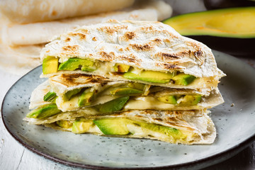Mexican quesadilla. Tortilla with cheese and avocado