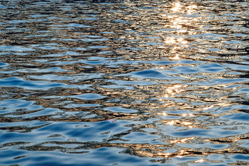 Water, sun glare on the water, reflections, sunny day, the sea background