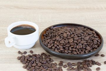 Coffee beans and coffee cup