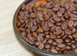Coffee beans in wood tray