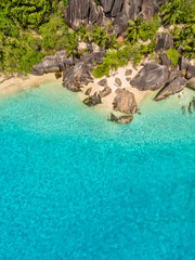 Aerial photo of tropical Seychelles beach at La Digue island - obrazy, fototapety, plakaty