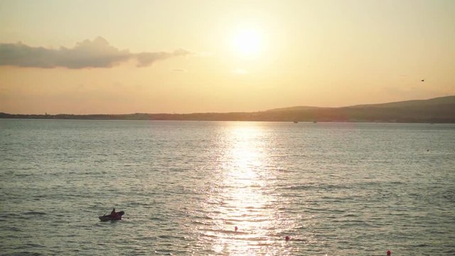 Black Sea bay and sunset, slow motion
