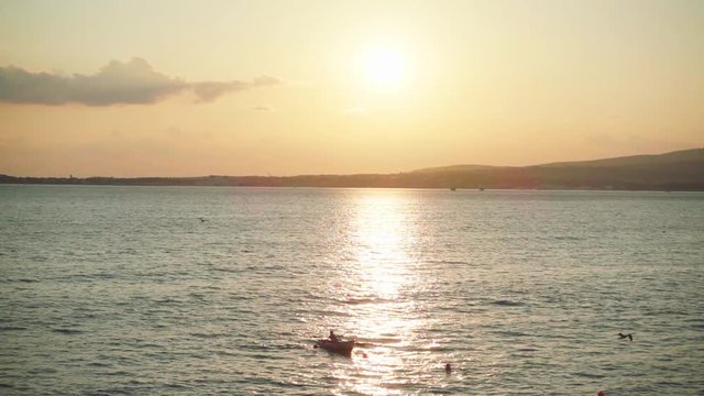 Black Sea bay and sunset, slow motion