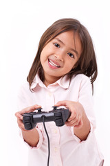 happy little girl gamer playing video game