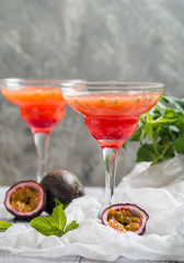 Alcoholic cocktail with fresh passion fruit