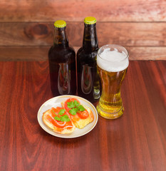Lager beer and sandwiches with the salted trout