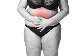 Fat woman with menstrual pain, endometriosis or cystitis, stomach ache, overweight female body...
