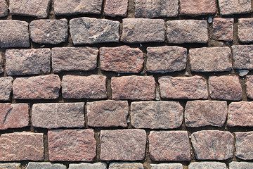 Texture of a red rectangular cobblestone.
