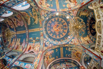 Fisheye view on beautiful St. Paraskeva church interior with dome painted by icons. Kondariotissa, Pieria, Greece.