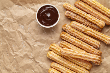 Churros traditional homemade Spain breakfast or lunch meal street fast food baked sweet dough snack...