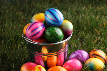 Row of Easter eggs in Fresh Green Grass