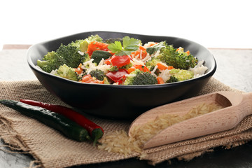 Colorful rice and vegetable salad - fresh mixed colorful healthy vegetarian food