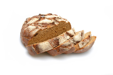 Black homemade bread sliced on a wooden background