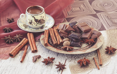 Obraz na płótnie Canvas Turkish coffee chocolate and spices toned
