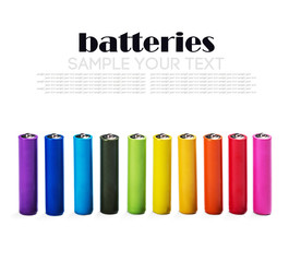 Different color alkaline batteries isolated on white background. Remove text