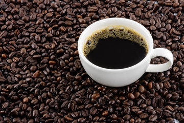 Coffee cup with beans