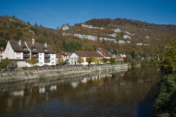 Fototapeta na wymiar Old Swiss town Saint-Ursanne with the river Doubs