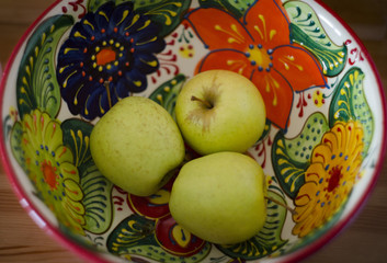 Green apple assortment in a Colorful bowl