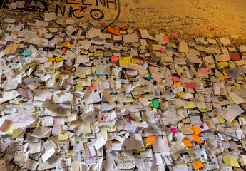 Part of the wall covered with love messages in Juliet house, Verona, Italy