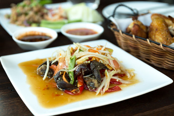 Green Papaya salad (Som tum) with field crab and grilled chicken