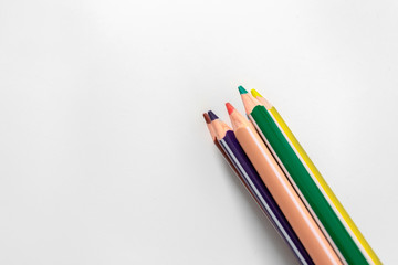 Colored pencils isolated on white