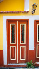 Red and yellow old door