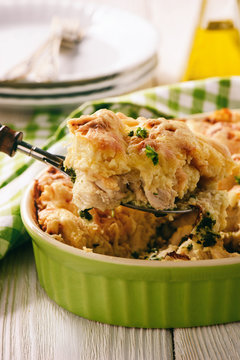 Bread casserole with chicken, spinach,eggs and cheese known as strata.
